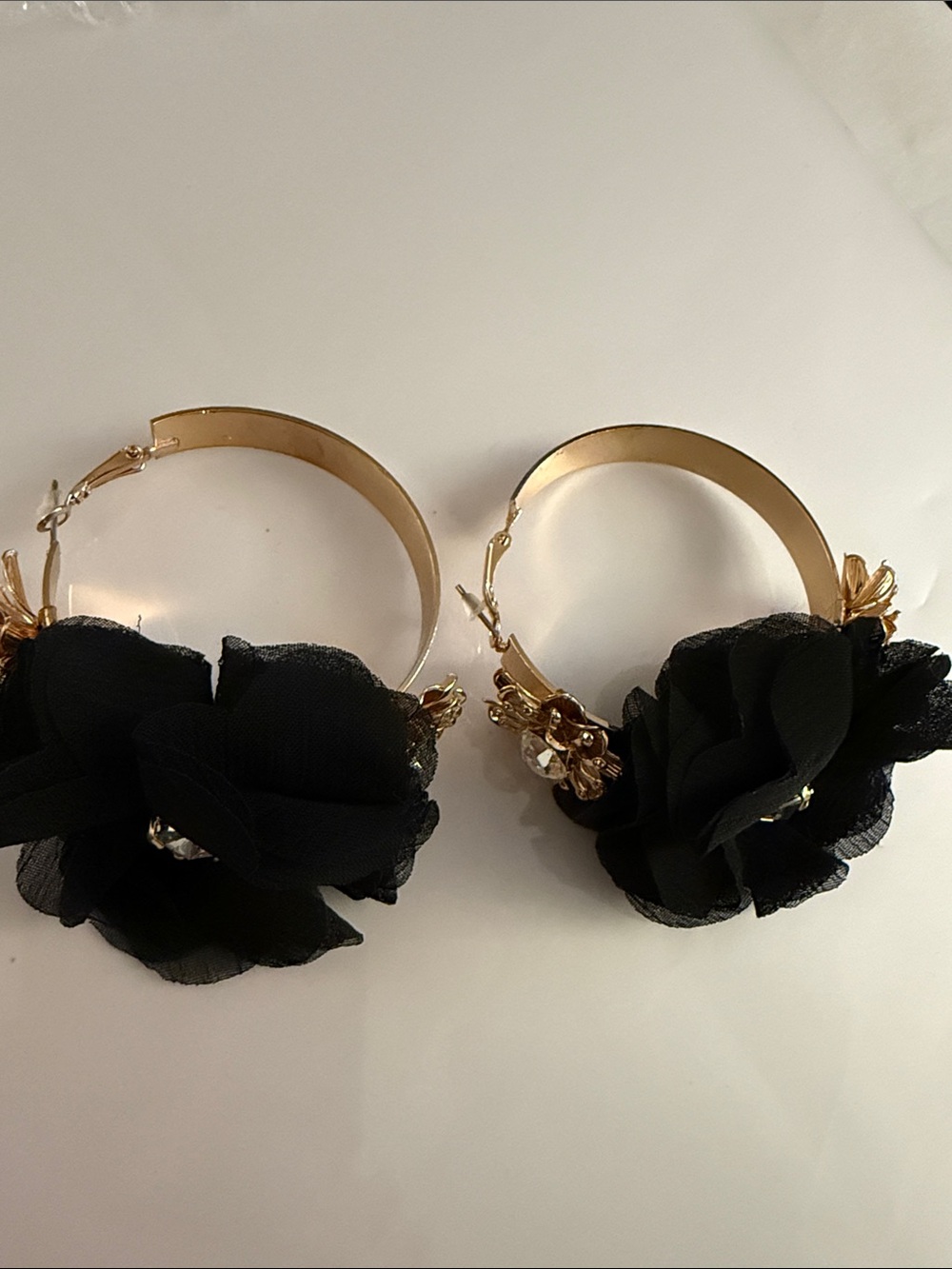 Gold Hoop Earrings with Black Floral Accents